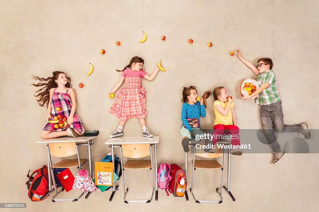 Children eating healthy food at school