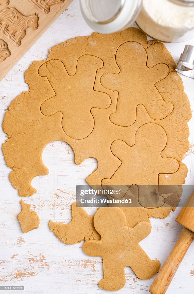 Gingerbread dough with gingerbread man cookie cutter