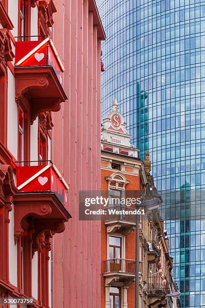 germany, hesse, frankfurt, view to old buildings at red light district in front of modern office building - bordello stock-fotos und bilder