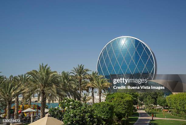 aldar  circular building in abu dhabi - aldar abu dhabi stock pictures, royalty-free photos & images