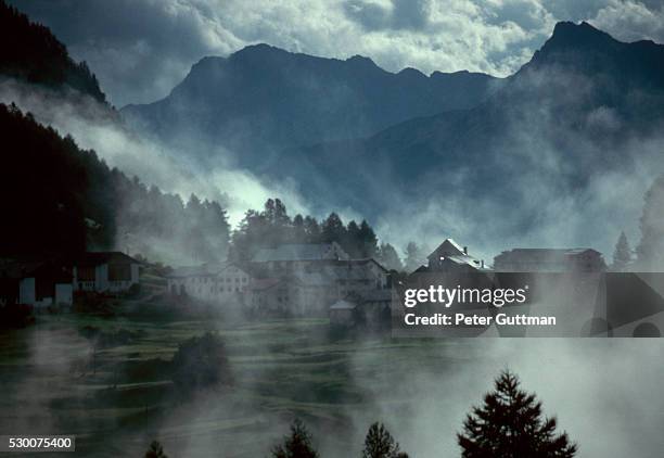 guarda in mist - guarda switzerland fotografías e imágenes de stock