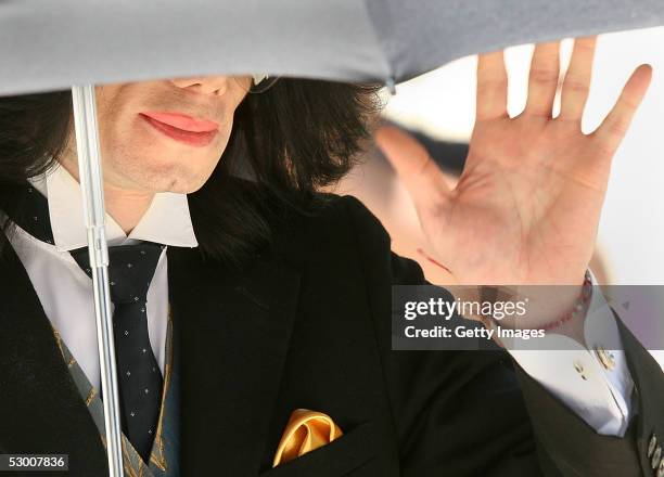 Michael Jackson departs the Santa Barbara County courthouse after hearing jury instructions June 1, 2005 in Santa Maria, California. Jackson is...