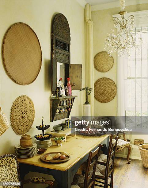 crystal chandelier above kitchen table - wall hanging stock pictures, royalty-free photos & images