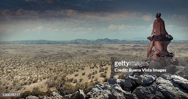 himba woman watching landscape - namibia women stock pictures, royalty-free photos & images
