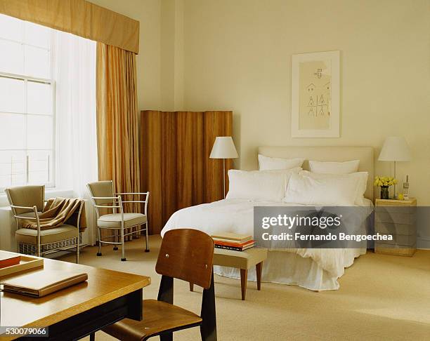 bedroom with wooden screen in corner - curtain valance stock pictures, royalty-free photos & images