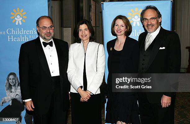 Of Wyeth Robert Essner, Karen Redlener, Anne Essner, and Children's Health Fund co-founder Irwin Redlener, pose for a photo during the Childrens...