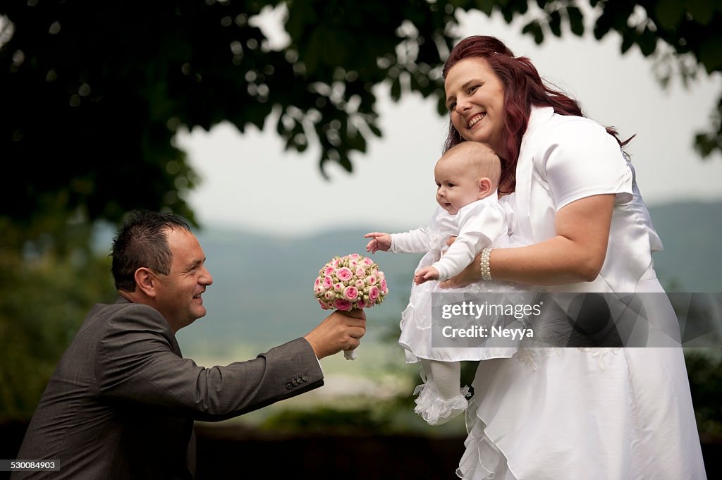 Bride and Groom with their Baby