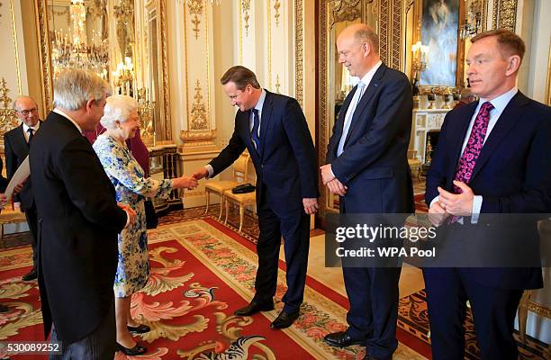 The Speaker of the House of Commons John Bercow introduces Prime Minister David Cameron to Queen Elizabeth II, as Chris Grayling , leader of the...
