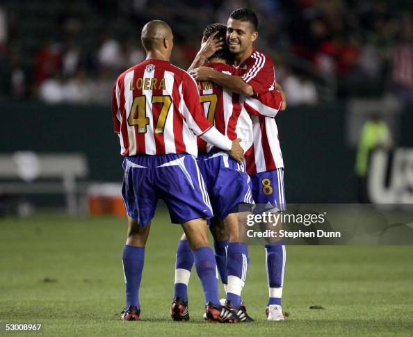 Chivas Ramon Ramon Ramirez of Chivas USA is congratulated by Francisco Gomez and ...