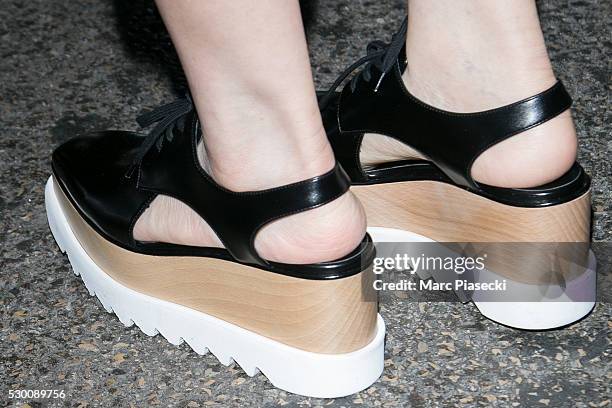 Actress Gong Li, Stella McCartney shoe detail, arrives at Nice airport during the annual 69th Cannes Film Festival at Nice Airport on May 10, 2016 in...