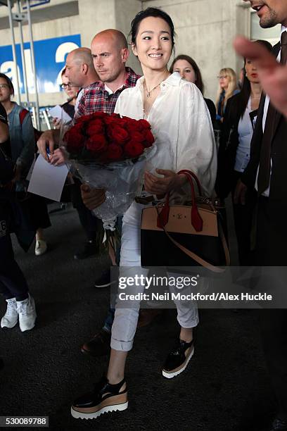 Gong Li arrives at Nice airport ahead of the 69th Annual Cannes Film Festival on May 10, 2016 in Nice, France.
