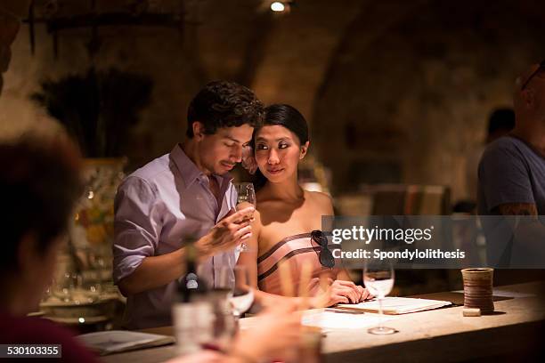 romantic young couple together in winery - napa valley stockfoto's en -beelden