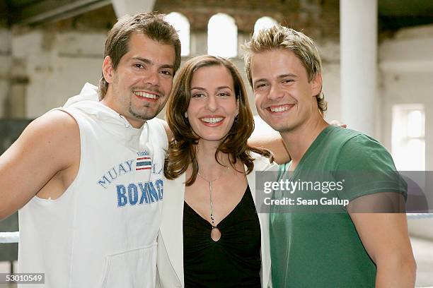 Actors Daniel Fehlow, Ulrike Frank and Pete Dwojak pose at a photocall on the set of the German television series "Gute Zeiten, Schlechte Zeiten"...