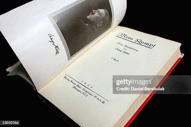 Signed copy of Adolph Hitler's Mein Kampf is displayed on June 2, 2005 in London, England. The Vol 1 , First Edition, signed by Hitler is one of a...