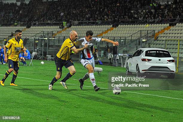 Ante Budimir, a Crotone forward and Simone Gozzi a Modena defender; fight for the ball during during the Serie B football match between FC Modena and...