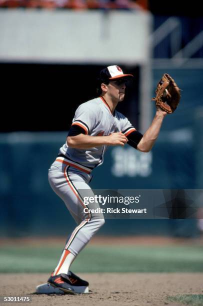 Cal Ripken Jr. #8 of the Baltimore Orioles catches the ball during a game in the 1985 season against the California Angels at Anaheim Stadium in...