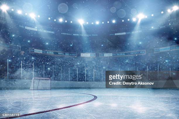 dramatic ice hockey arena - hockey stock pictures, royalty-free photos & images