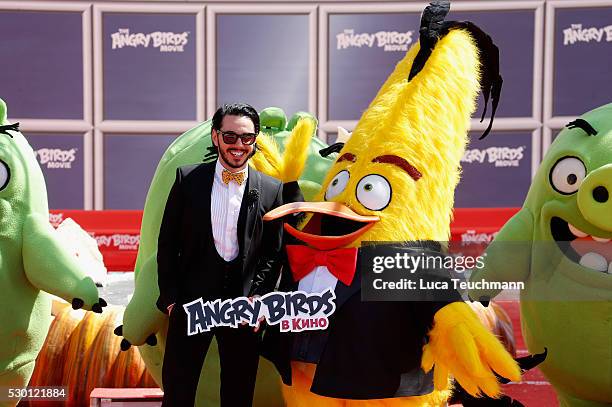 Russian singer Timur Rodriguez attends "The Angry Birds Movie" Photocall during the annual 69th Cannes Film Festival at JW Marriott on May 10, 2016...