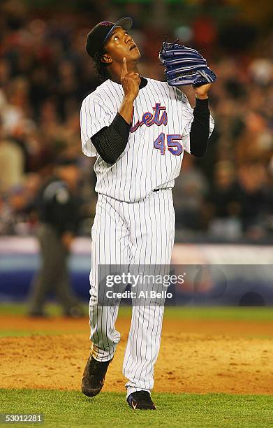 Starting pitcher Pedro Martinez of the New York Mets points to the sky after the eighth inning against the Arizona Diamondbacks on June 2, 2005 at...