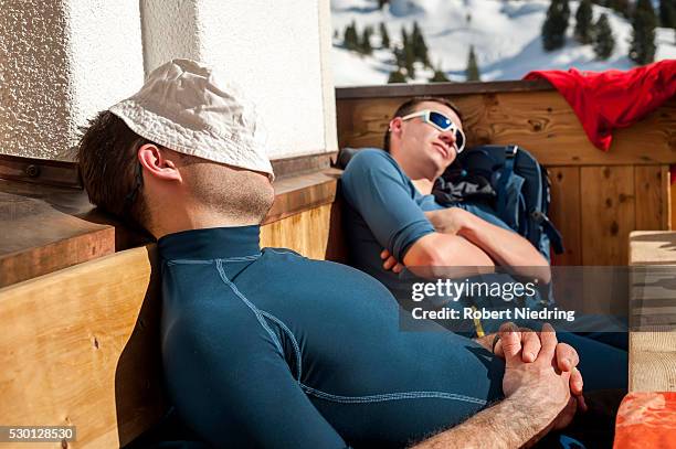 skiers resting at mountain hut, santa cristina, valgardena, alto adige, italy - ski hut stock pictures, royalty-free photos & images