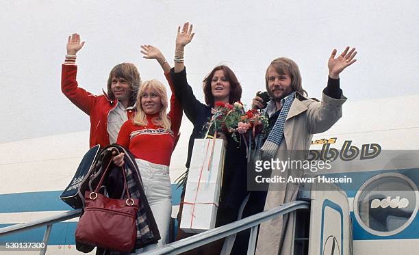Swedish pop group ABBA arrive for a tour of the USA on October 01, 1976 in the USA.