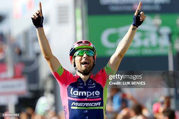 Italian cyclist Diego Ulissi of Lampre - Merida celebrates as he crosses the finish line at the end of the fourth stage during the 99th Giro...