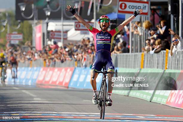 Italian cyclist Diego Ulissi of Lampre - Merida celebrates as he crosses the finish line at the end of the fourth stage during the 99th Giro...