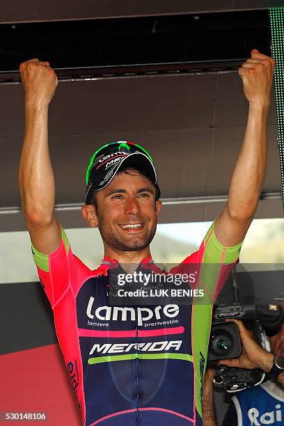 Italian cyclist Diego Ulissi of Lampre - Merida celebrates on the podium after winning the fourth stage during the 99th Giro d'Italia, Tour of Italy,...