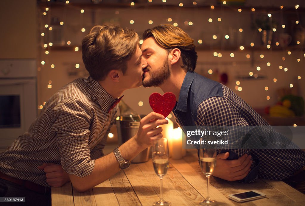 Loving gay couple celebrating Valentine's day.