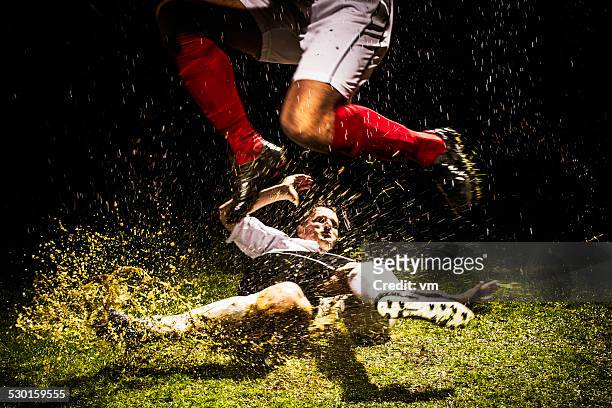 soccer players in action - football boot stock pictures, royalty-free photos & images