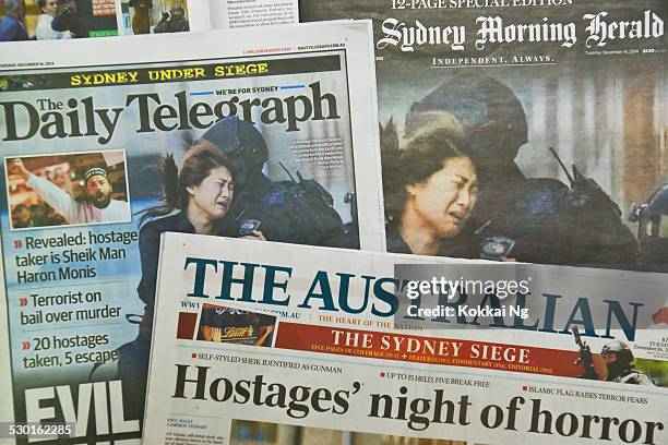 sydney siege: newspapers - terrorism news stock pictures, royalty-free photos & images