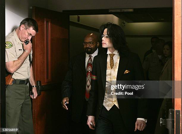Pop star Michael Jackson leaves the court room after closing arguments concluded in his child molestation trial June 3, 2005 in Santa Maria,...
