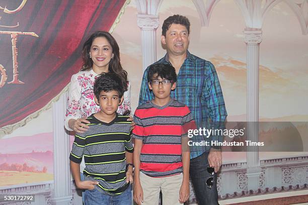 Bollywood actor Madhuri Dixit Nene along with her husband Sriram Nene and children Raayan Nene and Arin Nene during the Disney India's Beauty and the...