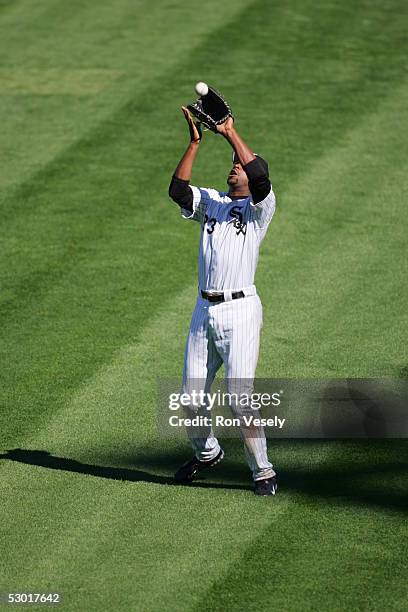 Jermaine Dye, #23 of the Chicago White Sox catches a fly ball during the game against the Los Angeles Angels at U.S. Cellular Field on May 30, 2005...