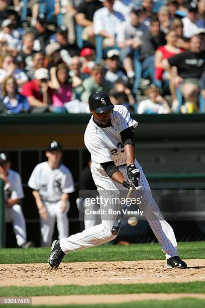 Jermaine Dye, #23 of the Chicago White Sox hits the ball during the game against the Los Angeles Angels at U.S. Cellular Field on May 30, 2005 in...
