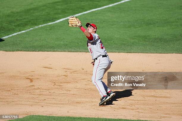 Infielder Dallas McPherson, #23 of the Los Angeles Angels fields his position during the game against the Chicago White Sox at U.S. Cellular Field on...