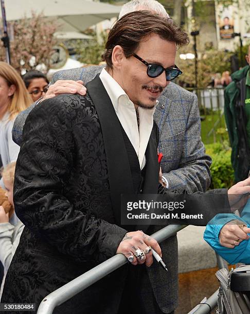 Johnny Depp attends the European Premiere of "Alice Through The Looking Glass" at Odeon Leicester Square on May 10, 2016 in London, England.