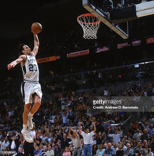 Manu Ginobili of the San Antonio Spurs takes the ball to the basket in Game three of the Western Conference Finals during the 2005 NBA Playoffs...