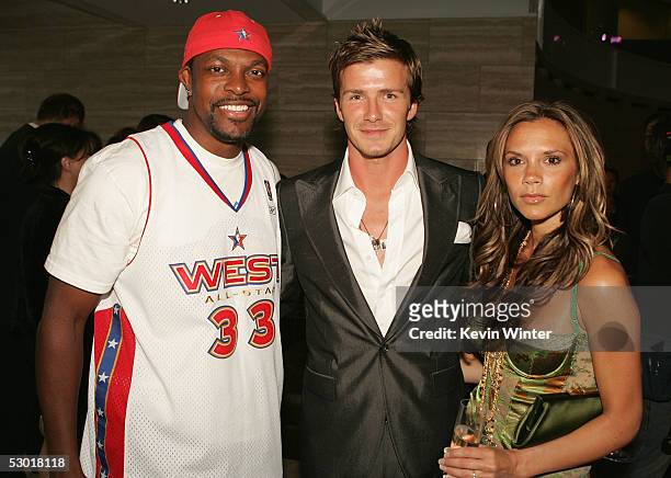 Actor Chris Tucker, England and Real Madrid football player David Beckham and wife Victoria pose at "The David Beckham Academy" launch party at...