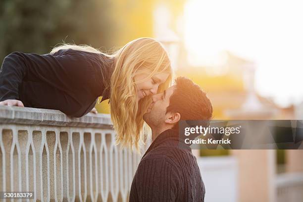 romeo and juliet - couple at balcony - romeo and juliet stock pictures, royalty-free photos & images