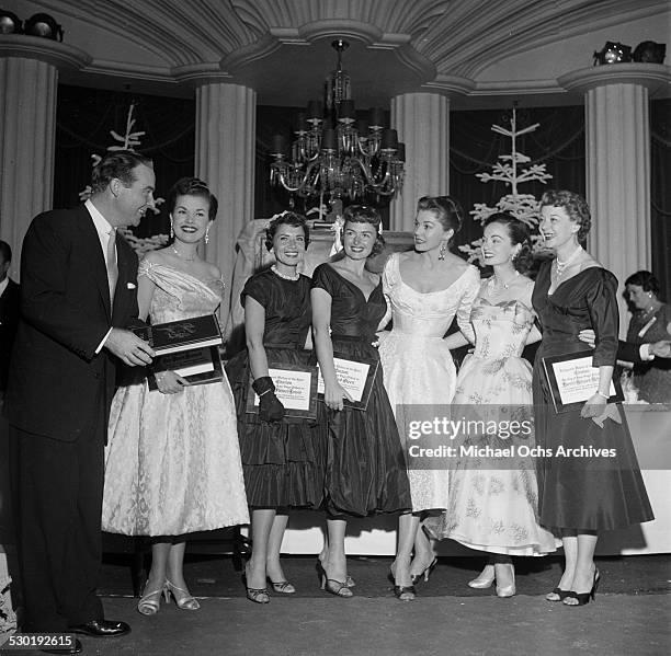Ralph Edwards, Gale Storm, Patty Lewis, Donna Reed, Esther Williams, Ann Blyth and Harriet Hilliard Nelson pose during the Mother of the Year event...