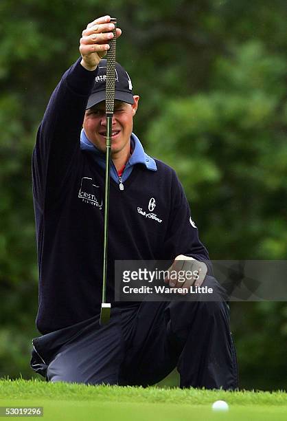 Alessandro Tadini of Italy lines up a ptt on the third green during the third round of The Celtic Manor Wales Open 2005 at The Celtic Manor Resort on...