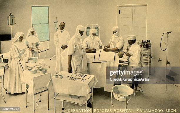 Vintage operating room and medical staff at Borgess Hospital in Kalamazoo, Michigan , 1910.