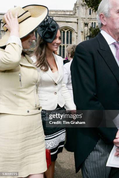 Kate Middleton, Prince William's girlfriend chats and laughs with friends and guests at the society wedding of Hugh Van Cutsem Junior to Rose Astor...