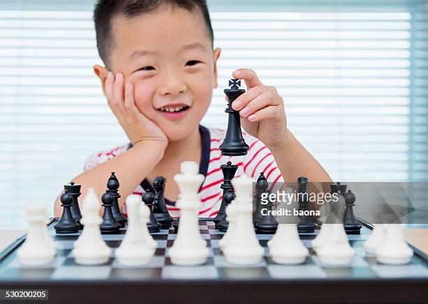 chess - kids playing chess stock pictures, royalty-free photos & images