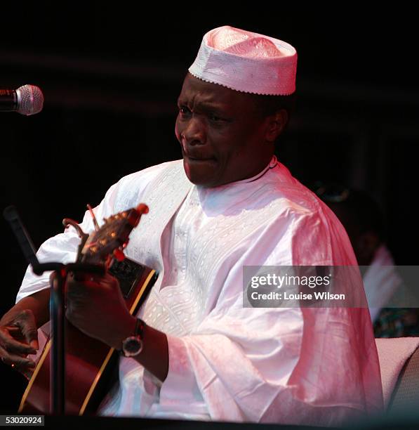 Mory Kante performs on stage at the second day of the Wychwood Festival 2005 at Cheltenham Racecourse on June 4, 2005 in Gloucestershire, England....