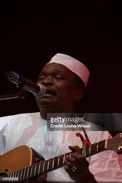 Mory Kante performs on stage at the second day of the Wychwood Festival 2005 at Cheltenham Racecourse on June 4, 2005 in Gloucestershire, England....