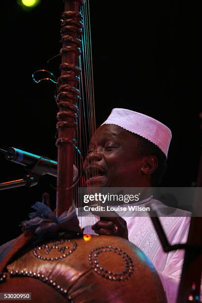 Mory Kante performs on stage at the second day of the Wychwood Festival 2005 at Cheltenham Racecourse on June 4, 2005 in Gloucestershire, England....