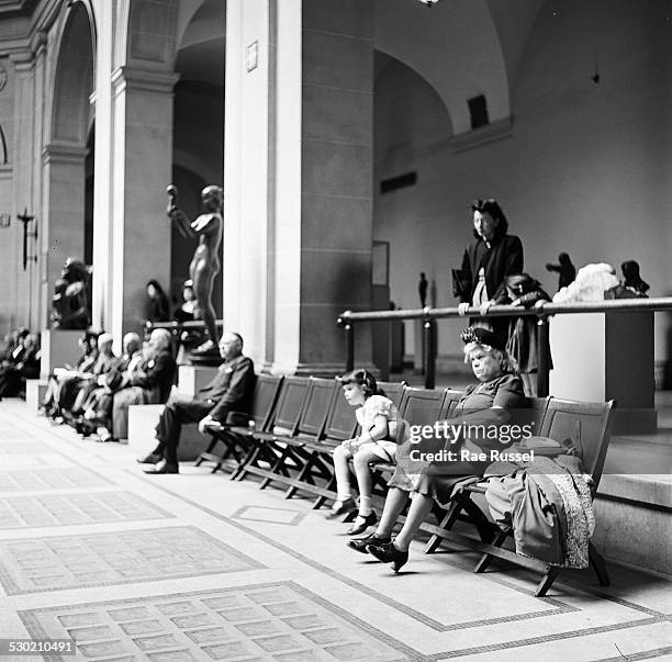 View of the crowd watching a concert sponsored by WNYC radio and held at the Brooklyn Museum, Brooklyn, New York, New York, 1947.