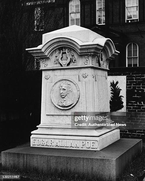 The grave monument of author Edgar Allen Poe, in the graveyard of Westminster Presbyterian Church, on Fayette and Greene Streets, Baltimore,...